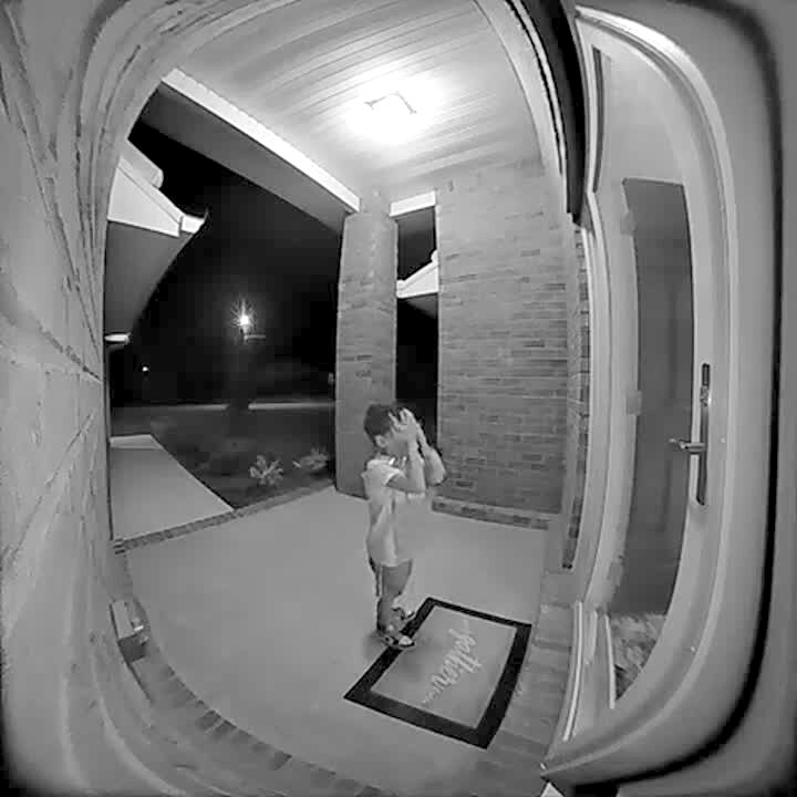 Video thumbnail showing: A young boy runs into the front glass door at full speed and crashes into it, falling to the ground. Security footage.