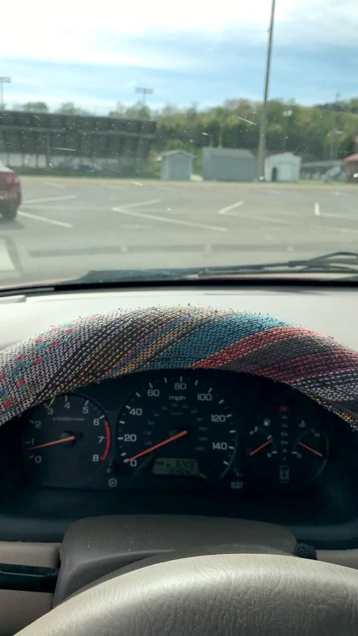 Video thumbnail showing: A man with a drink in his hand walks in front of a car in a parking lot and the person in the car honks the horn. The man gets scared and shakes and drops his drink on the ground.