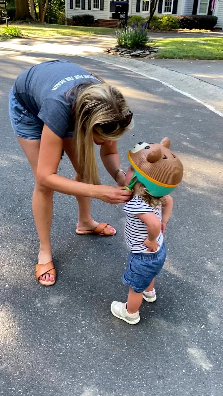 Video thumbnail showing: A man in the street sets up an air propelled rocket. A tot boy jumps onto the pump before the grandpa leaves and the rocket hits him in the face.